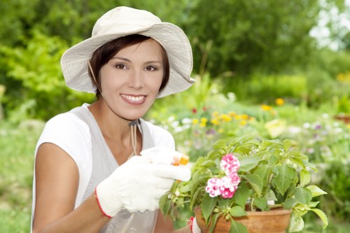 Operator using protective equipment while pruning